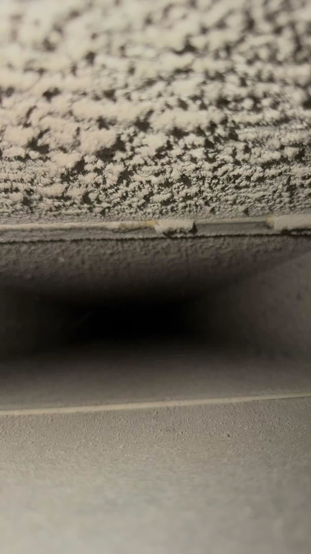 Close-up of buildup inside an air duct